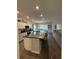 Open-concept kitchen with a large island, perfect for entertaining at 832 Vienna Dr, Winter Haven, FL 33884
