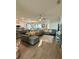 Spacious open-concept living area with modern furnishings, offering ample seating and natural light at 832 Vienna Dr, Winter Haven, FL 33884