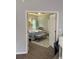 View of the main bedroom featuring light-colored walls and wood-look flooring with a light-colored area rug at 832 Vienna Dr, Winter Haven, FL 33884