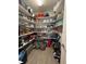 Well-stocked pantry features ample shelving and a variety of storage options for organized convenience at 832 Vienna Dr, Winter Haven, FL 33884