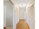 Hallway with closet doors on the right at 961 Oleander Se Dr, Winter Haven, FL 33880