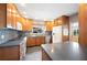 Well-equipped kitchen with tile backsplash, stainless steel appliances, custom cabinets, and a center island at 961 Oleander Se Dr, Winter Haven, FL 33880