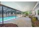 Pool area enclosed by screen at 961 Oleander Se Dr, Winter Haven, FL 33880