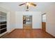 Open-concept sun room featuring tile flooring, white trim, and access to other rooms at 961 Oleander Se Dr, Winter Haven, FL 33880