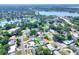 Aerial view showing the property's location in a residential neighborhood with lake access nearby at 961 Piedmont Se Dr, Winter Haven, FL 33880