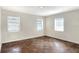 Spacious bedroom featuring tile flooring and multiple windows offering ample natural light at 961 Piedmont Se Dr, Winter Haven, FL 33880