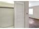 View of a sliding closet and the bedroom at 961 Piedmont Se Dr, Winter Haven, FL 33880