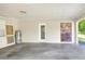 Attached garage offers potential for storage or parking with an access door to the backyard at 961 Piedmont Se Dr, Winter Haven, FL 33880