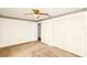 Spacious bedroom offers double closet and ceiling fan at 109 Dakota Ave, St Cloud, FL 34769