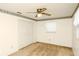 Bedroom with double closet, neutral walls, ceiling fan and natural light at 109 Dakota Ave, St Cloud, FL 34769