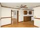 Open dining area with ceiling fan conveniently adjacent to kitchen with natural light at 109 Dakota Ave, St Cloud, FL 34769