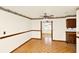 Bright dining room features parquet floors and a ceiling fan at 109 Dakota Ave, St Cloud, FL 34769