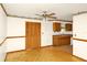 Eat in kitchen featuring ceiling fan, natural wood cabinets, and plenty of counter space at 109 Dakota Ave, St Cloud, FL 34769