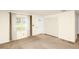 The living room features carpeted floors, a closet, and a large window at 109 Dakota Ave, St Cloud, FL 34769