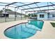 A screened pool with concrete surround, pool access and easy access to house at 109 Dakota Ave, St Cloud, FL 34769