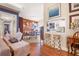 Cozy dining area with wood accents and a view into the kitchen, featuring a breakfast bar at 114 Belmont Dr, Winter Haven, FL 33884
