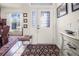 This home has a well-lit entryway with stained glass on the door and sidelight at 114 Belmont Dr, Winter Haven, FL 33884
