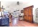 Inviting entryway with decorative front door, hardwood floors, and elegant furnishings at 114 Belmont Dr, Winter Haven, FL 33884