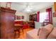 Comfortable living room with ceiling fan, wood accents, and ample natural light at 114 Belmont Dr, Winter Haven, FL 33884