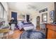 A spacious main bedroom featuring elegant décor, a cozy seating area, and ample natural light at 114 Belmont Dr, Winter Haven, FL 33884