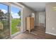 Bedroom with beautiful view from a sliding door and wood flooring at 1256 Center St, Lake Wales, FL 33859