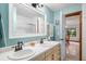 Clean, refreshing bathroom featuring double sinks and ample natural light at 1273 Scrub Jay Trl, Frostproof, FL 33843