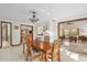 Open dining room features natural light and transitions seamlessly into adjacent living spaces, great for entertaining at 1273 Scrub Jay Trl, Frostproof, FL 33843