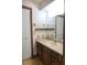 Bathroom features a large mirror, vanity and cabinet with plenty of storage space at 1334 Highland Park S Dr, Lake Wales, FL 33898