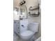 Nicely renovated bathroom with new faucet, toilet, and vanity with open storage at 1334 Highland Park S Dr, Lake Wales, FL 33898