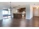 Open-concept living space with modern flooring and seamless connection to the outdoor patio and kitchen at 1334 Highland Park S Dr, Lake Wales, FL 33898