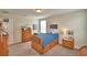 Bedroom featuring a bed with built-in storage, carpeted floors, and light from the window at 1433 Bunker Dr, Davenport, FL 33896