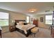 Large main bedroom filled with natural light offers comfortable seating and spacious layout at 1433 Bunker Dr, Davenport, FL 33896