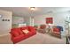Comfortable upstairs living area offers seating, movie decor and flexible layout at 1433 Bunker Dr, Davenport, FL 33896