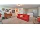 Open upstairs living area features a cozy seating arrangement and movie-themed decorations at 1433 Bunker Dr, Davenport, FL 33896