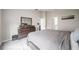 Spacious bedroom with a dark wood dresser at 1719 Durden Dr, Winter Haven, FL 33880