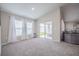 Light-filled living room with a sliding door to the patio, offering indoor-outdoor living at 1719 Durden Dr, Winter Haven, FL 33880