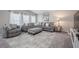 Living room featuring neutral colors, comfortable seating and many windows at 1719 Durden Dr, Winter Haven, FL 33880