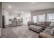 Spacious open-concept living room with a stylish kitchen and comfortable seating at 1719 Durden Dr, Winter Haven, FL 33880