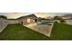 A private backyard featuring an in-ground pool, patio, and well-maintained lawn at 1765 Kingsmill Dr, Bartow, FL 33830