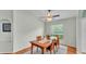 Well-lit dining room featuring a ceiling fan and a bright window at 1765 Kingsmill Dr, Bartow, FL 33830
