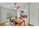 Cozy dining room with views into the kitchen showcasing a functional layout at 1765 Kingsmill Dr, Bartow, FL 33830