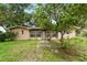 Charming single story home with mature landscaping and an inviting front yard at 1810 Roanoke Ave, Lakeland, FL 33803