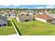 Spacious backyard featuring lush green grass and white vinyl fencing at 204 Walkers Point Dr, Auburndale, FL 33823