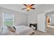 Neutral bedroom with large window and bright, airy feel at 204 Walkers Point Dr, Auburndale, FL 33823