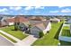 Charming single Gathering home with a well-manicured lawn and two car garage at 204 Walkers Point Dr, Auburndale, FL 33823