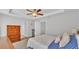 Main bedroom with a tray ceiling and two closets at 204 Walkers Point Dr, Auburndale, FL 33823