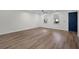 Bedroom featuring hardwood floors, a ceiling fan, and plenty of natural light at 2052 W Elliott St, Lakeland, FL 33805