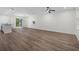 Spacious living room with hardwood floors and natural light and sliding glass doors at 2052 W Elliott St, Lakeland, FL 33805