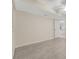 Bedroom with tile floors, ceiling fan, double door closet and access to the hall at 208 Lake Howard Nw Dr # 104, Winter Haven, FL 33880