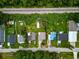 Aerial view highlighting property boundary, surrounded by a green lawn and a quiet neighborhood at 2480 Avenue E Sw, Winter Haven, FL 33880